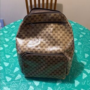 Gucci Brown Monogram Backpack & Duffle bag